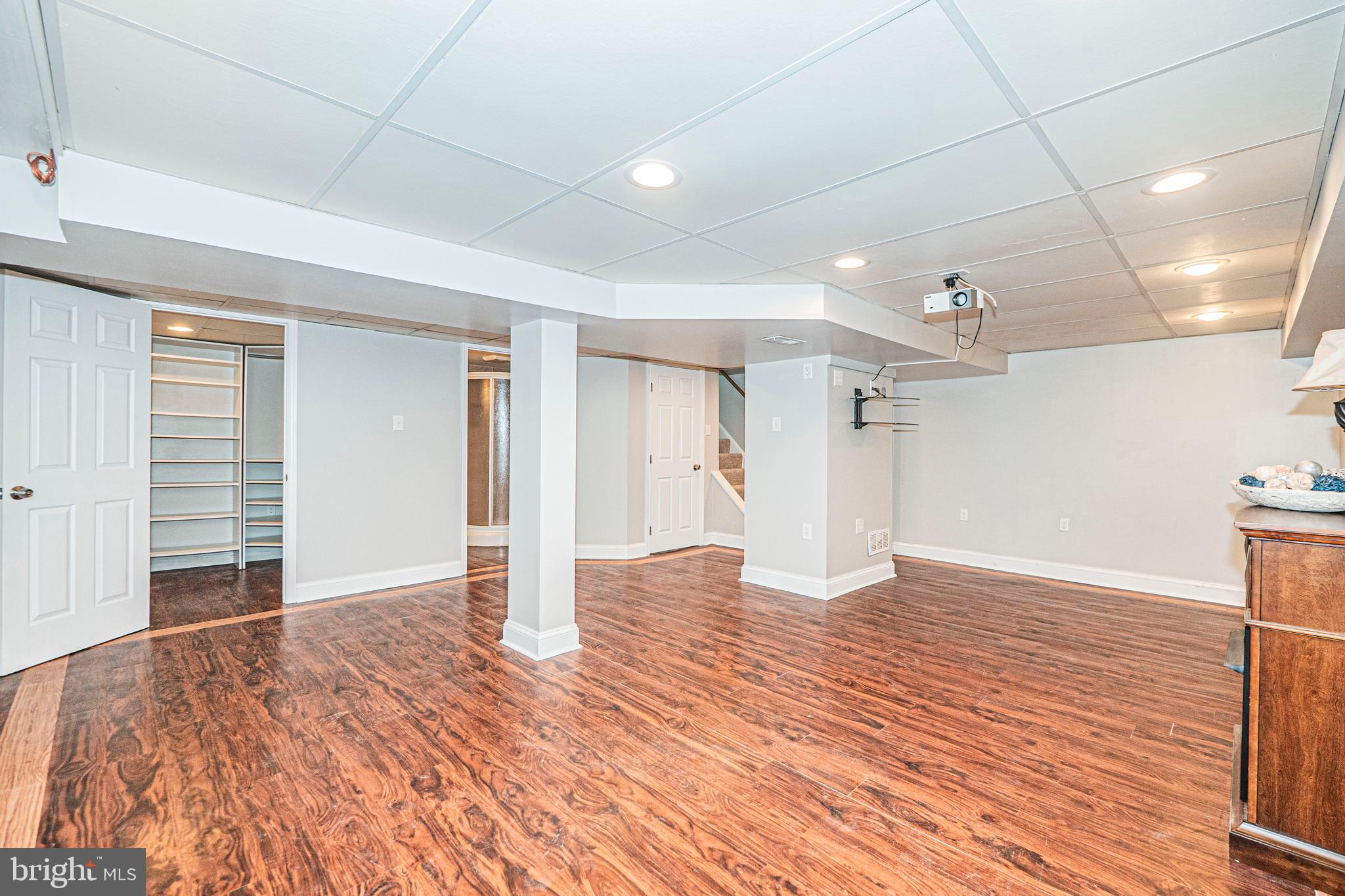 103 Nursery Road Linthicum Heights, MD 21090 - Photo 40 of 60 Lower Level - Rec Room & Staircase View
