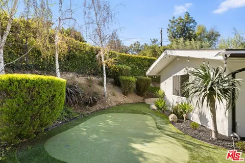 a view of swimming pool from a outdoor space