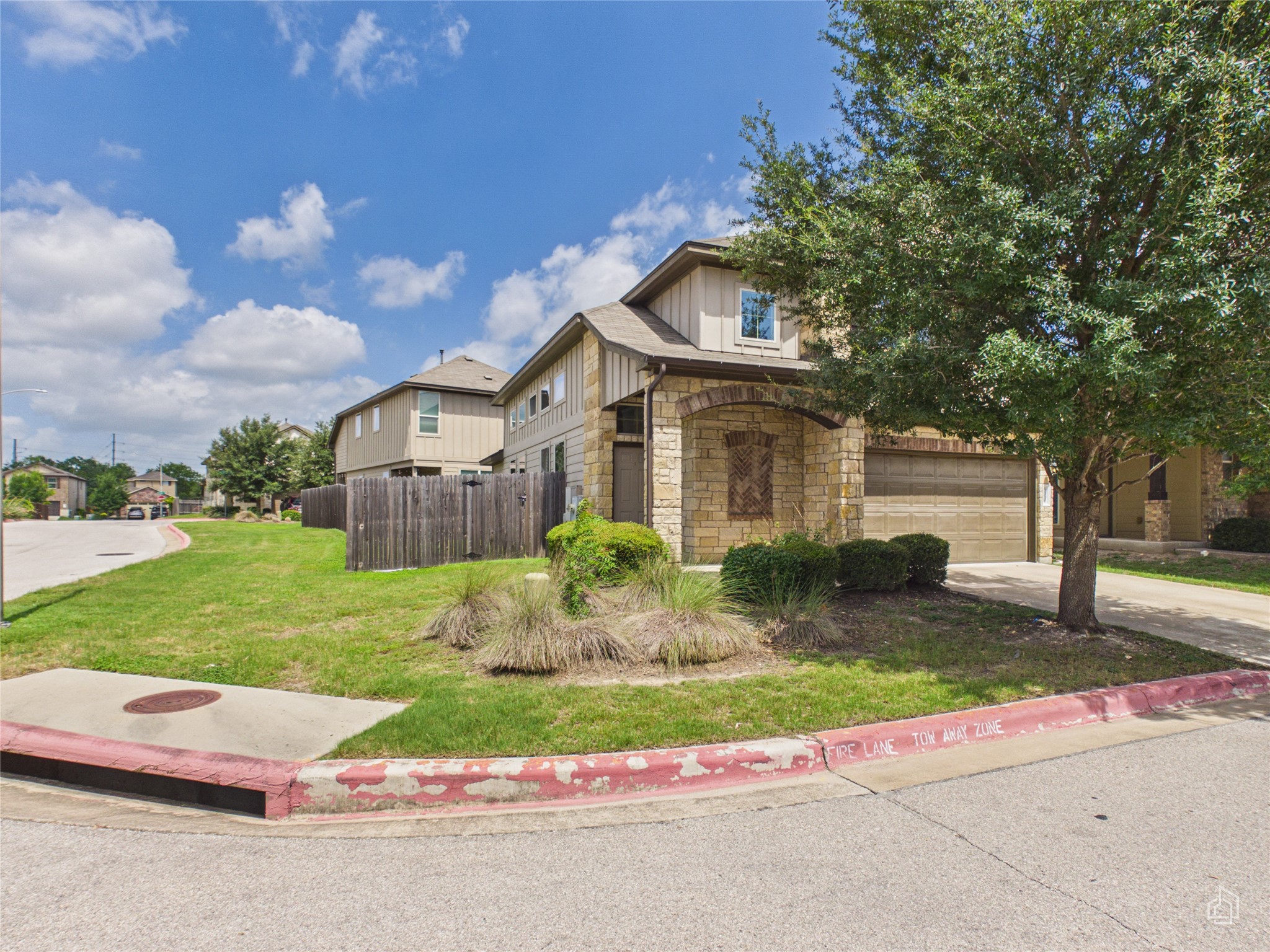 9310 Tanager Way Austin, TX 78748 - Photo 28 of 32 A well-kept lawn and a welcoming stone facade greet you at this charming residence.