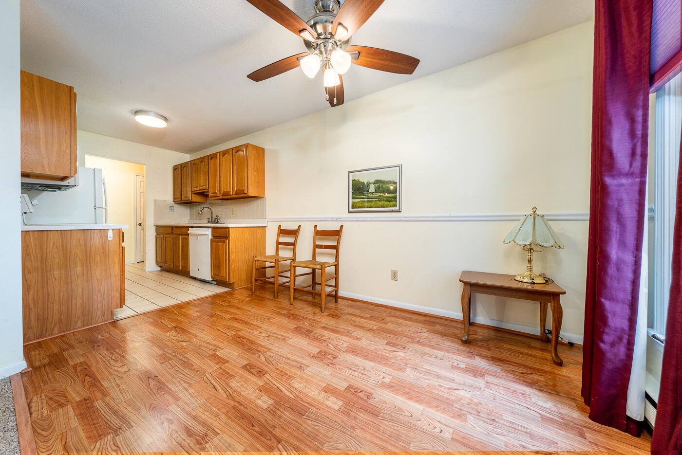 432 Old Chatham Road, Unit 308 South Dennis, MA 02660 - Photo 1 of 25 a bedroom with furniture and a chandelier