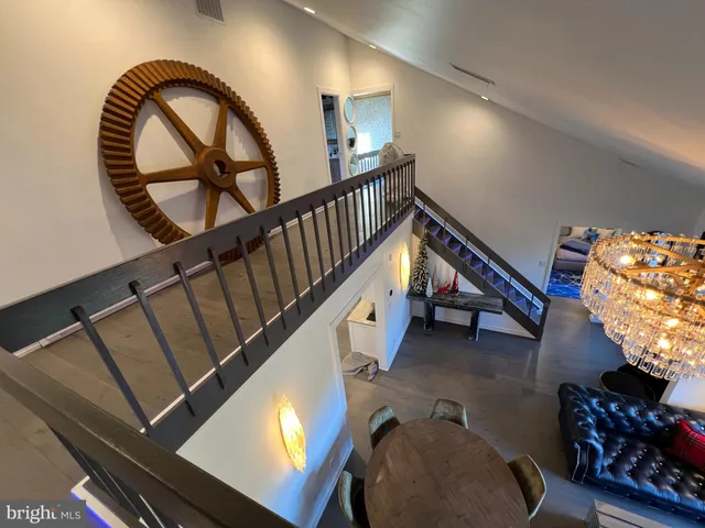 a bedroom with bed and a flat screen tv