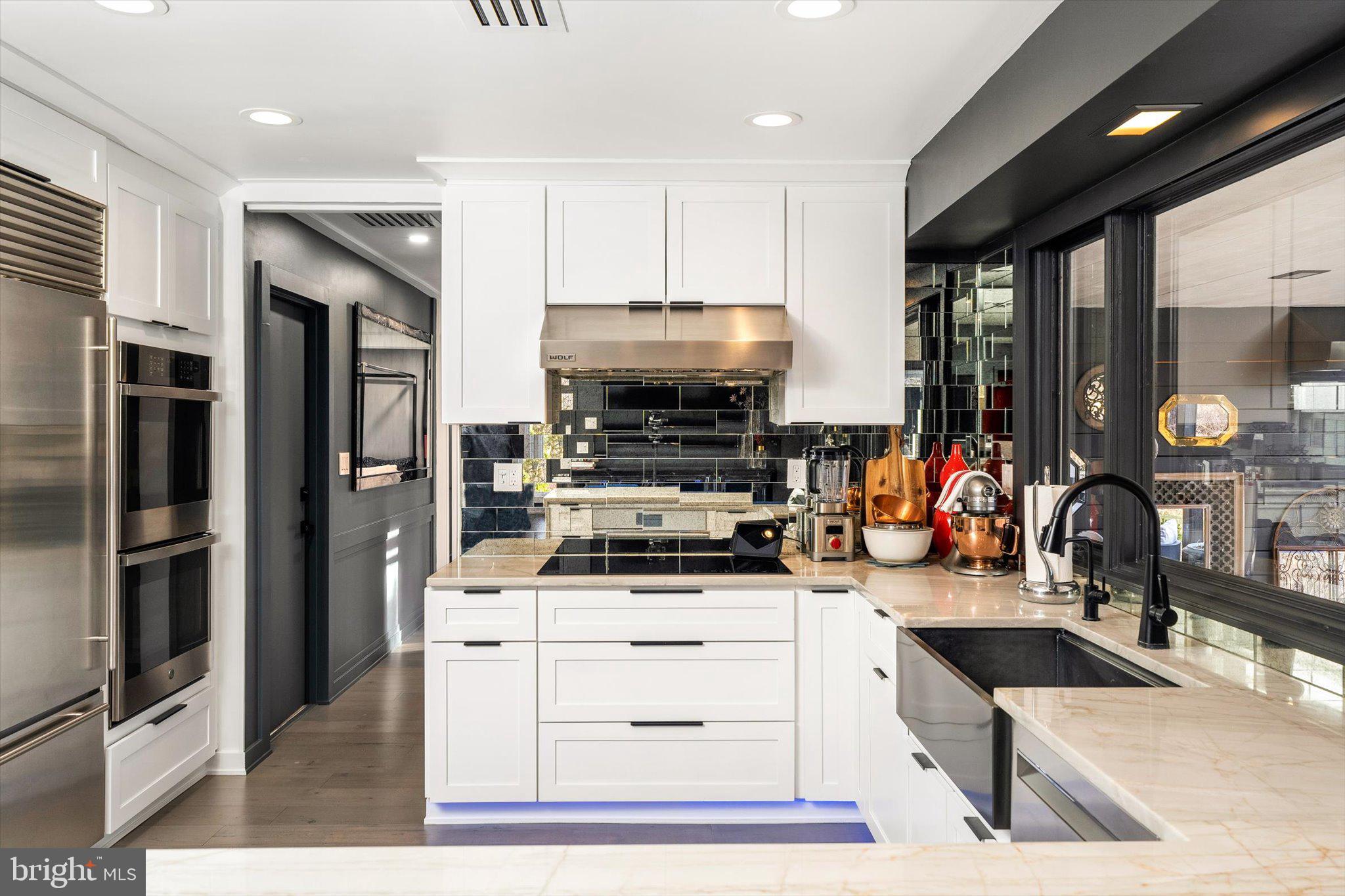 1615 Harbourton Rocktown Road Lambertville, NJ 08530 - Photo 14 of 50 a kitchen with stainless steel appliances kitchen island granite countertop a stove and a sink