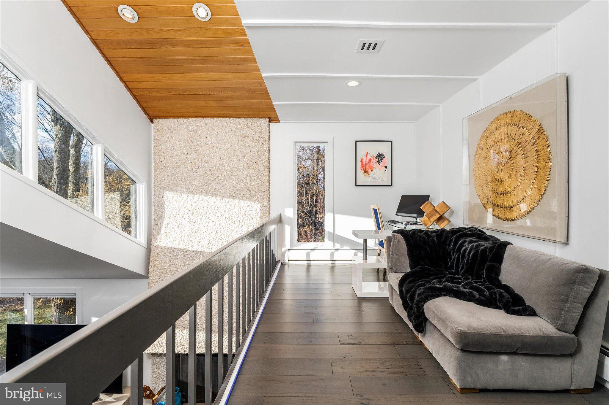 1615 Harbourton Rocktown Road Lambertville, NJ 08530 - Photo 22 of 50 a living room with furniture and a wooden floor