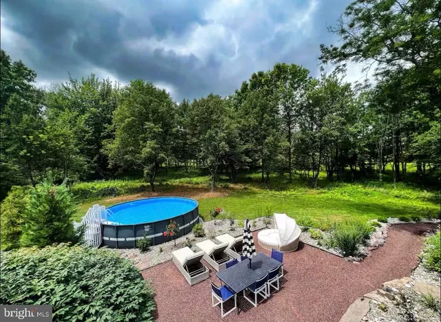 a view of house with wooden fence