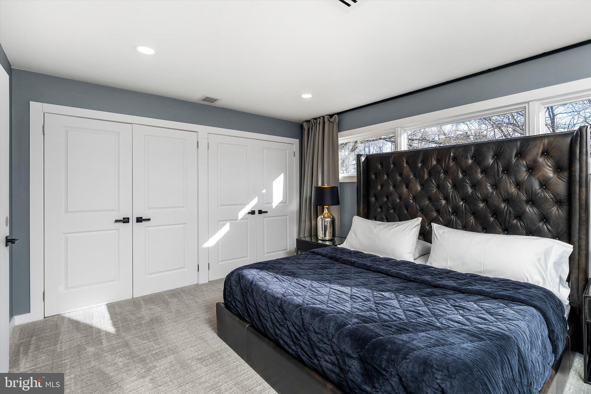 1615 Harbourton Rocktown Road Lambertville, NJ 08530 - Photo 26 of 50 a bedroom with a large bed and a window