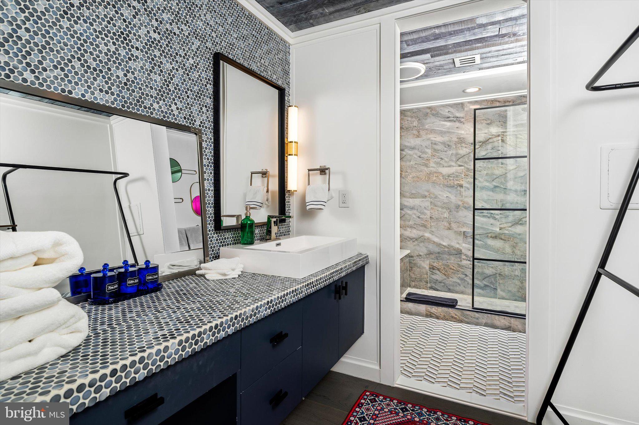1615 Harbourton Rocktown Road Lambertville, NJ 08530 - Photo 31 of 50 a bathroom with a granite countertop sink and a mirror