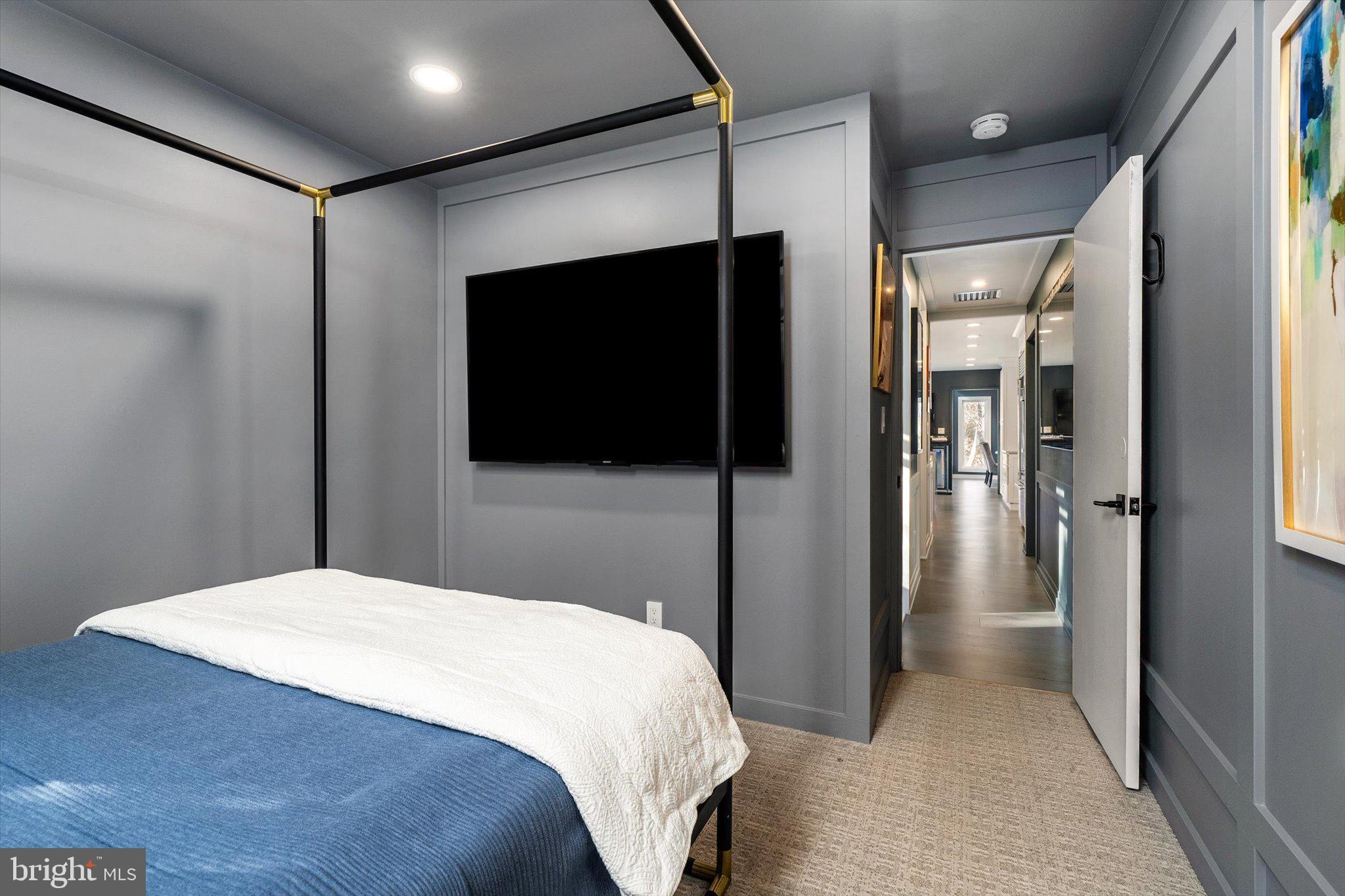 1615 Harbourton Rocktown Road Lambertville, NJ 08530 - Photo 33 of 50 a bedroom with a bed and a flat screen tv