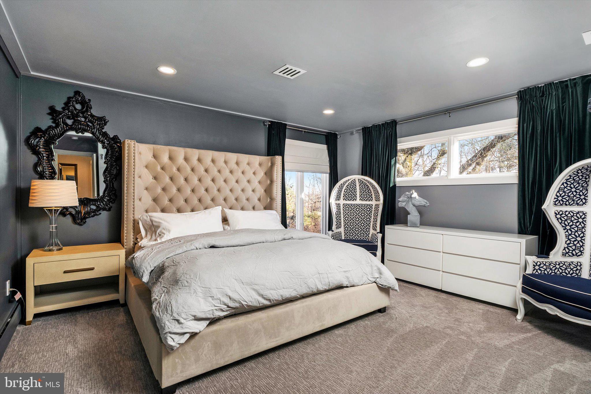 1615 Harbourton Rocktown Road Lambertville, NJ 08530 - Photo 35 of 50 a bedroom with a bed and a flat screen tv