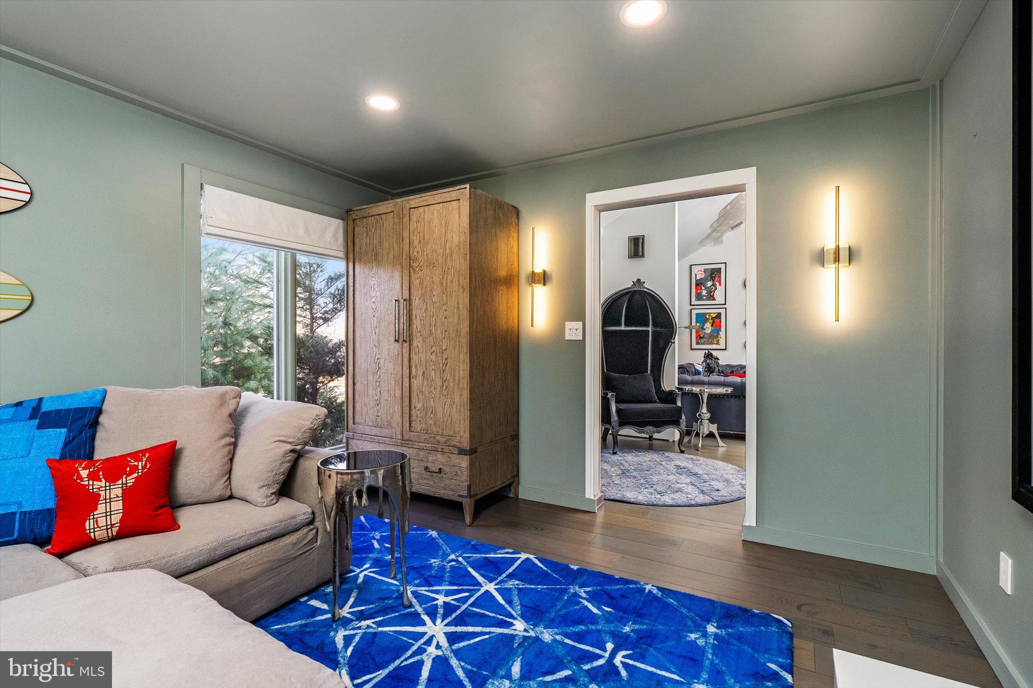 1615 Harbourton Rocktown Road Lambertville, NJ 08530 - Photo 38 of 50 a living room with furniture a rug and a window