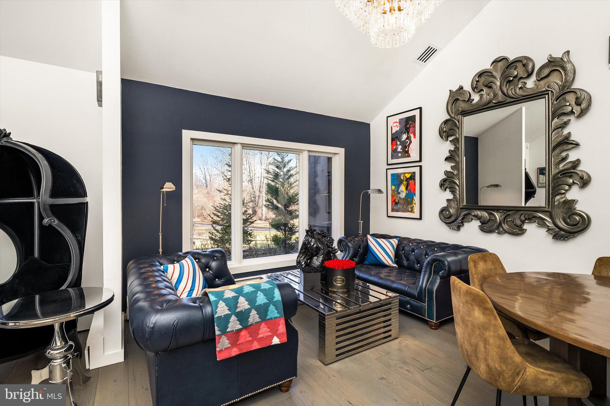1615 Harbourton Rocktown Road Lambertville, NJ 08530 - Photo 4 of 50 a living room with furniture and a flat screen tv