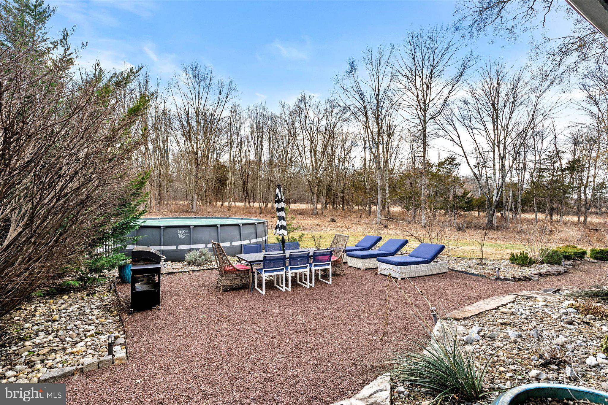 1615 Harbourton Rocktown Road Lambertville, NJ 08530 - Photo 48 of 50 a view of a patio with swimming pool and sitting area