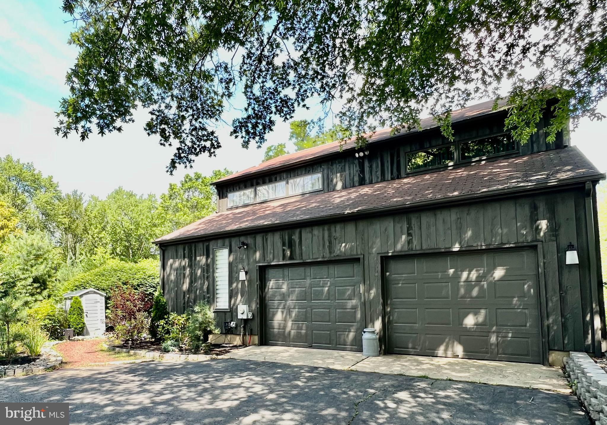 1615 Harbourton Rocktown Road Lambertville, NJ 08530 - Photo 49 of 50 a front view of a house with a garden