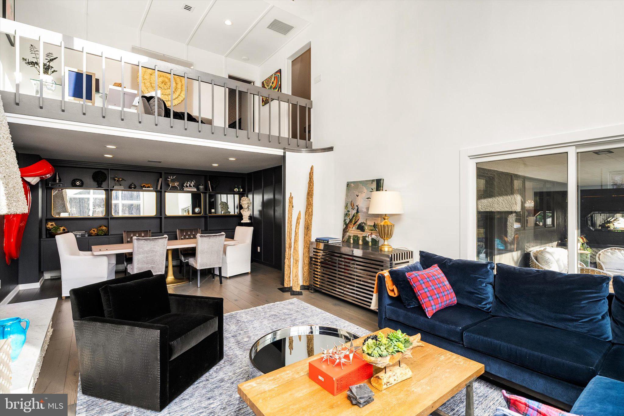 1615 Harbourton Rocktown Road Lambertville, NJ 08530 - Photo 6 of 50 a living room with furniture and a floor to ceiling window