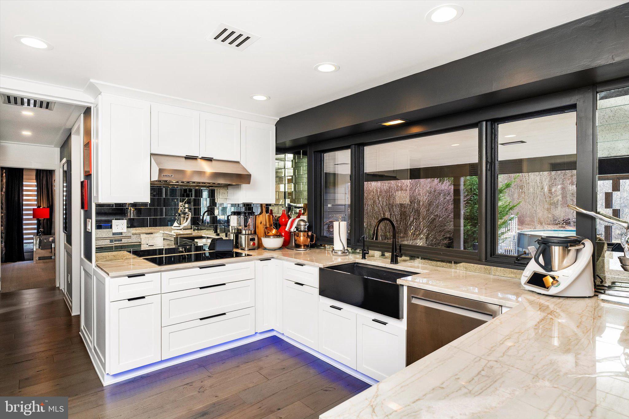 1615 Harbourton Rocktown Road Lambertville, NJ 08530 - Photo 10 of 50 a kitchen with stainless steel appliances kitchen island granite countertop a stove and a sink