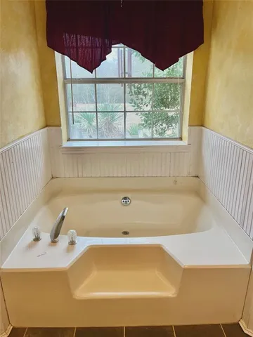 a bathroom with a bathtub