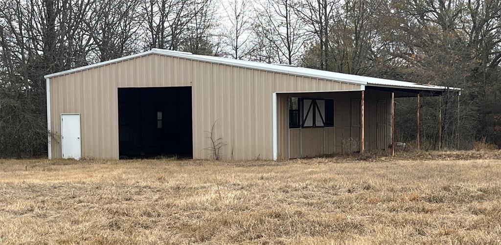 3771 County Road Detroit, TX 75436 - Photo 2 of 30 4 STALL HORSE BARN