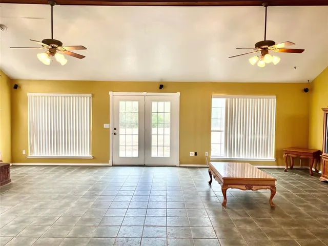 a view of a livingroom with furniture and window