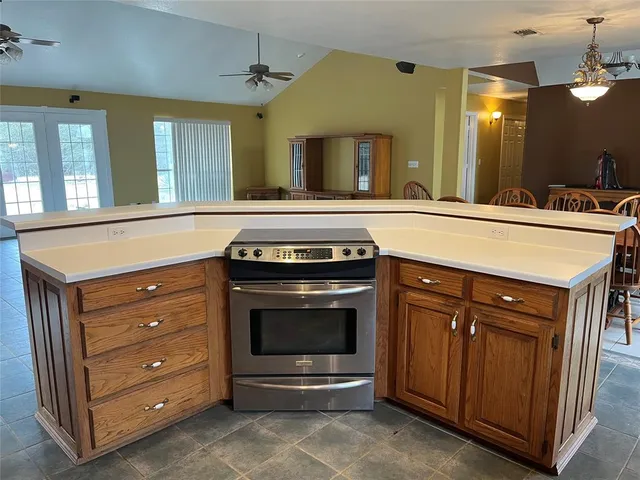 a kitchen with a stove and a sink
