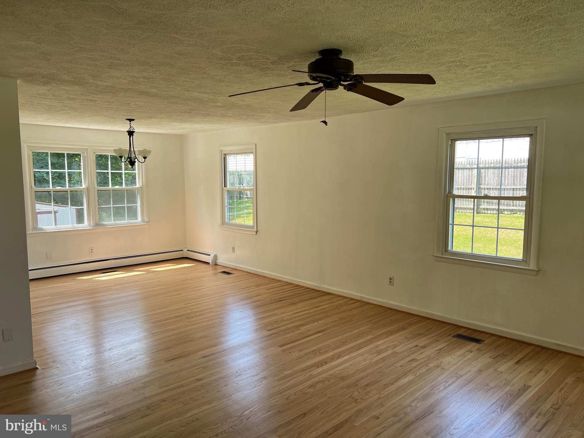4729 Conowingo Road Darlington, MD 21034 - Photo 20 of 26 a view of an empty room with a window and wooden floor