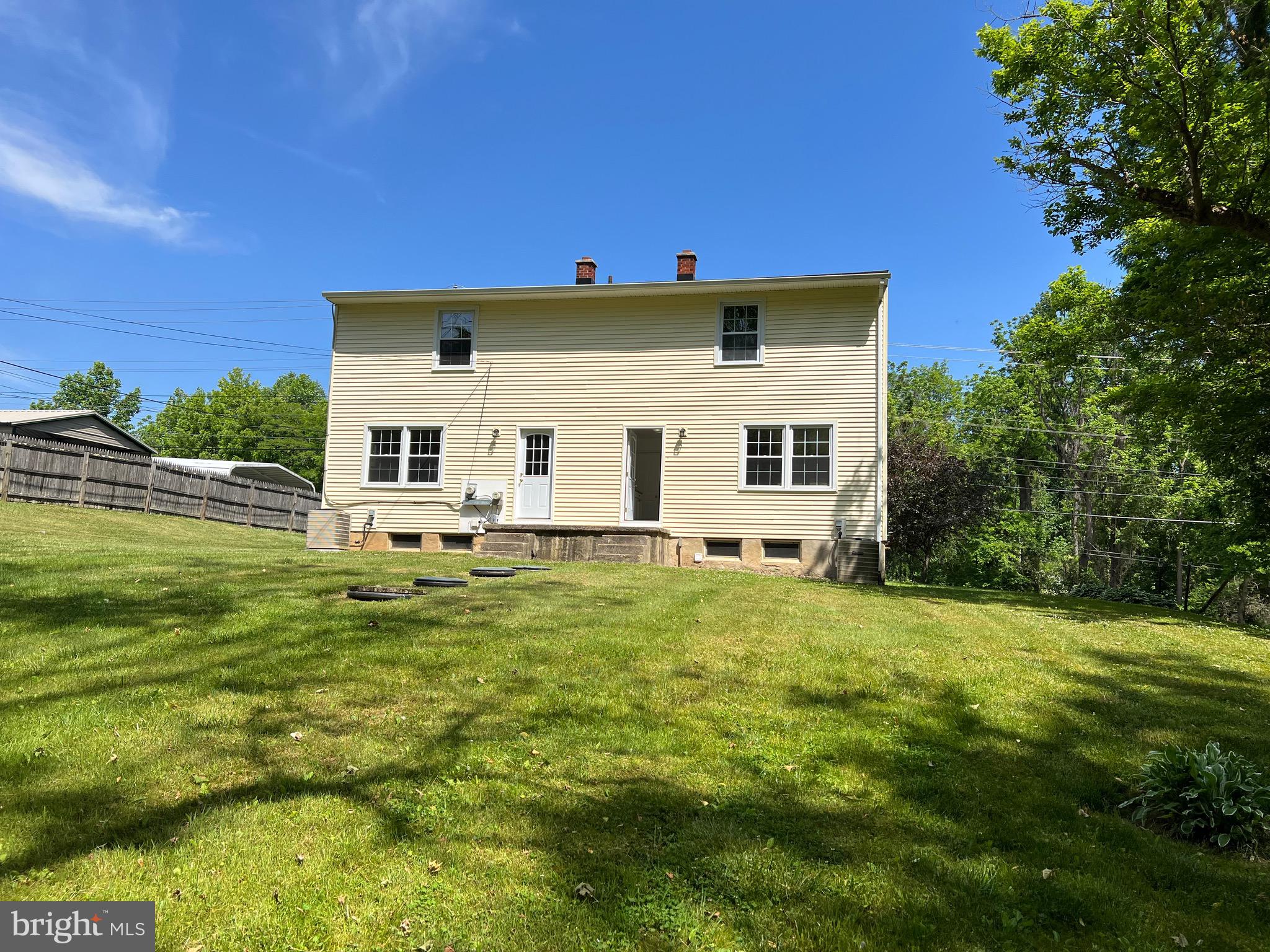 4729 Conowingo Road Darlington, MD 21034 - Photo 25 of 26 a backyard of a house with table and chairs