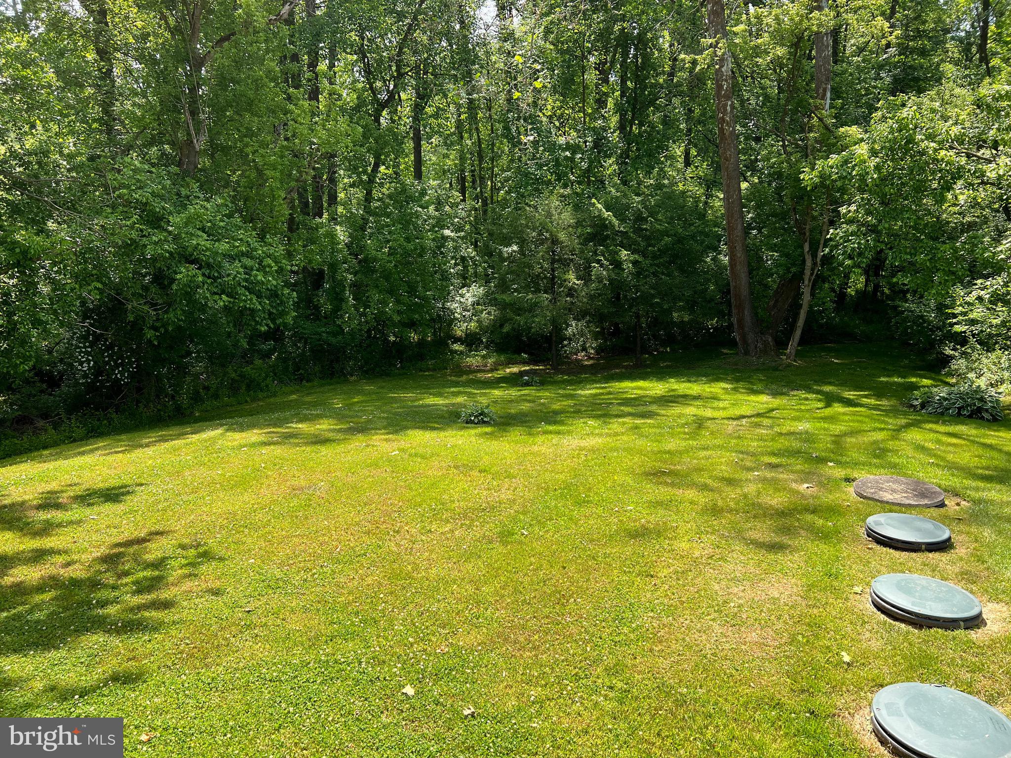 4729 Conowingo Road Darlington, MD 21034 - Photo 26 of 26 a view of a swimming pool with an outdoor space and seating area