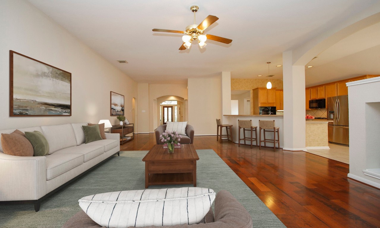 1114 Bringewood Chase Drive Spring, TX 77379 - Photo 11 of 49 Large living room with wood floors