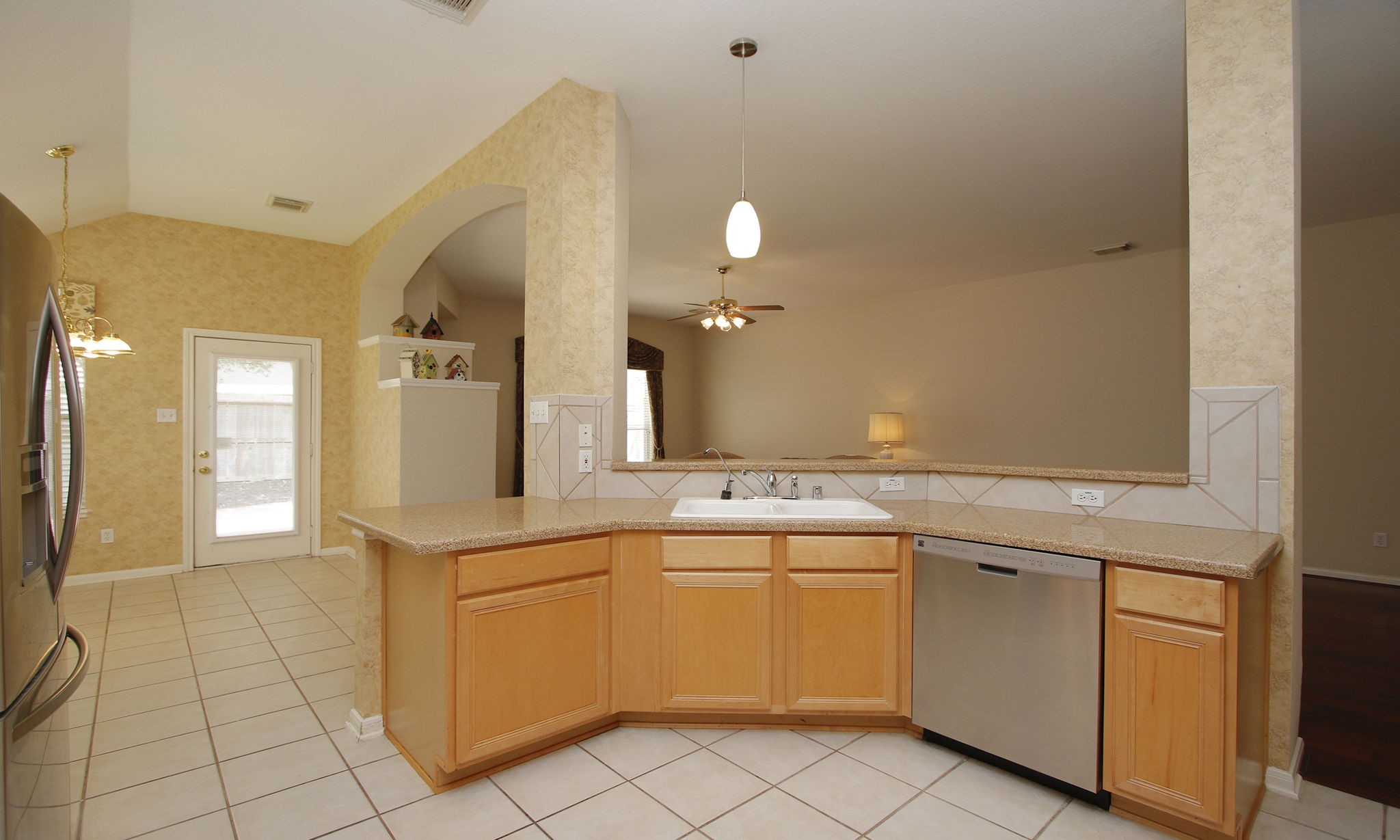 1114 Bringewood Chase Drive Spring, TX 77379 - Photo 19 of 49 a kitchen with a sink and cabinets