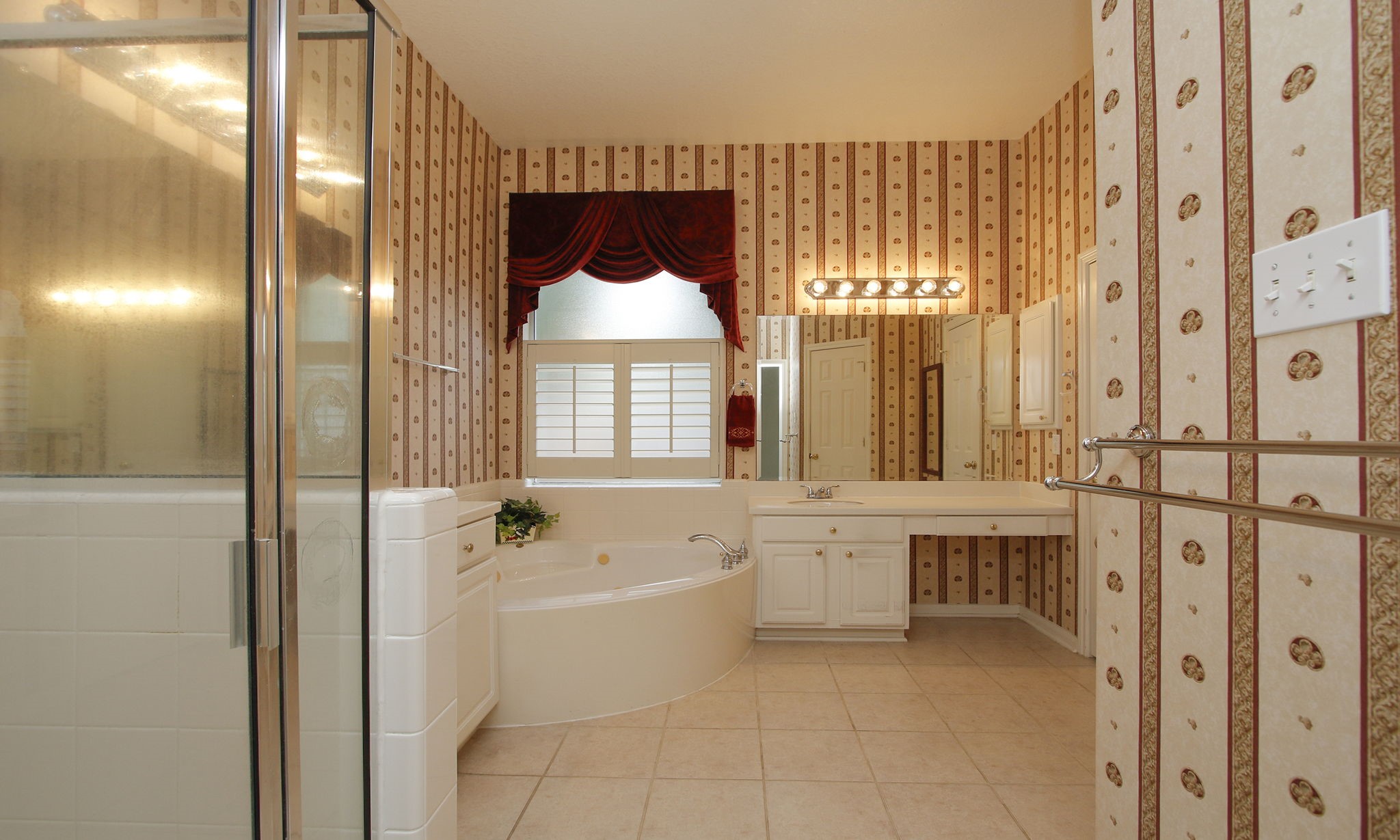 1114 Bringewood Chase Drive Spring, TX 77379 - Photo 23 of 49 a bathroom with a tub sink and mirror