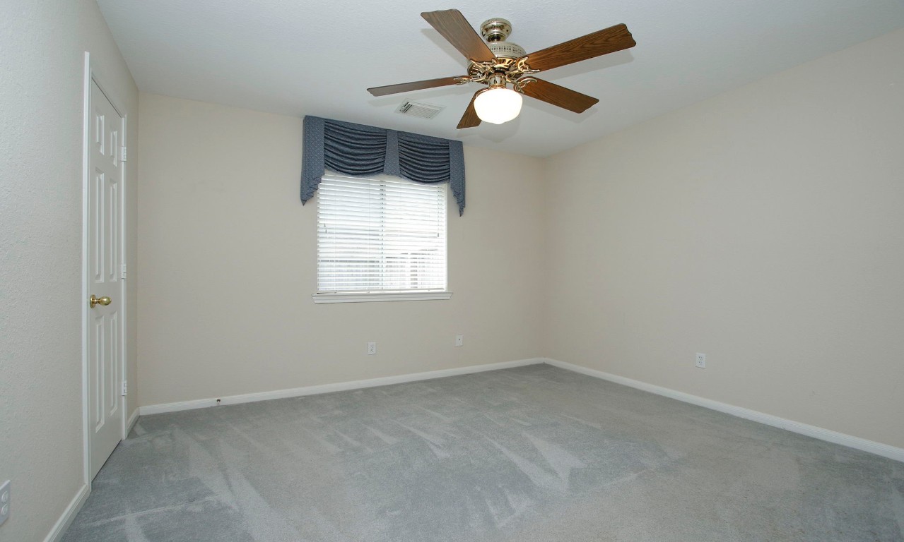 1114 Bringewood Chase Drive Spring, TX 77379 - Photo 28 of 49 an empty room with a window