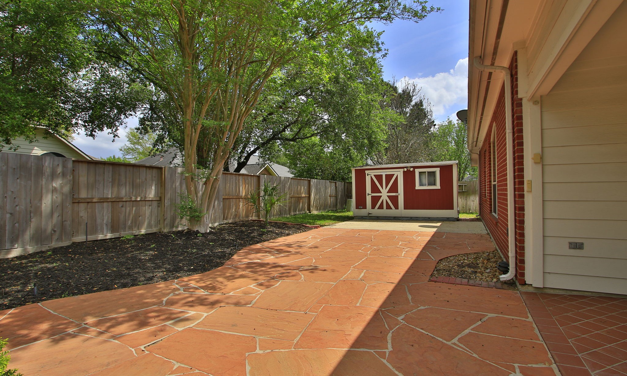 1114 Bringewood Chase Drive Spring, TX 77379 - Photo 36 of 49 Limited grass and large flowerbeds