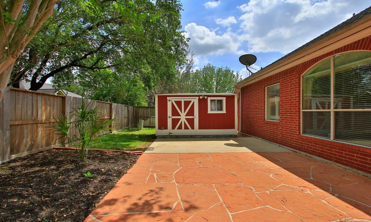 1114 Bringewood Chase Drive Spring, TX 77379 - Photo 40 of 49 a view of backyard with green space