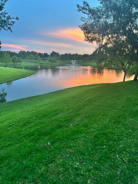 1114 Bringewood Chase Drive Spring, TX 77379 - Photo 47 of 49 a view of a lake with houses in the back