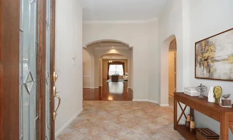 a kitchen with stainless steel appliances a stove a microwave and cabinets