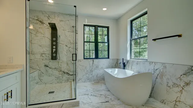 a front view of a house with a yard table and chairs