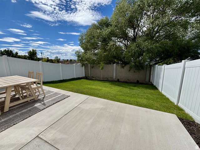 461 West 490 North Lindon, UT 84042 - Photo 18 of 18 Fenced backyard featuring a patio area and outdoor dining area