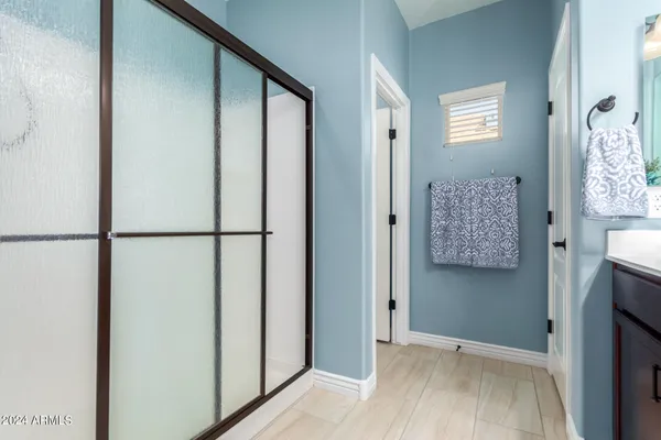 a view of front door with wooden floor