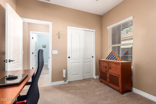 a room with furniture and window