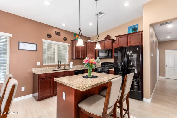 a view of a dining room with furniture