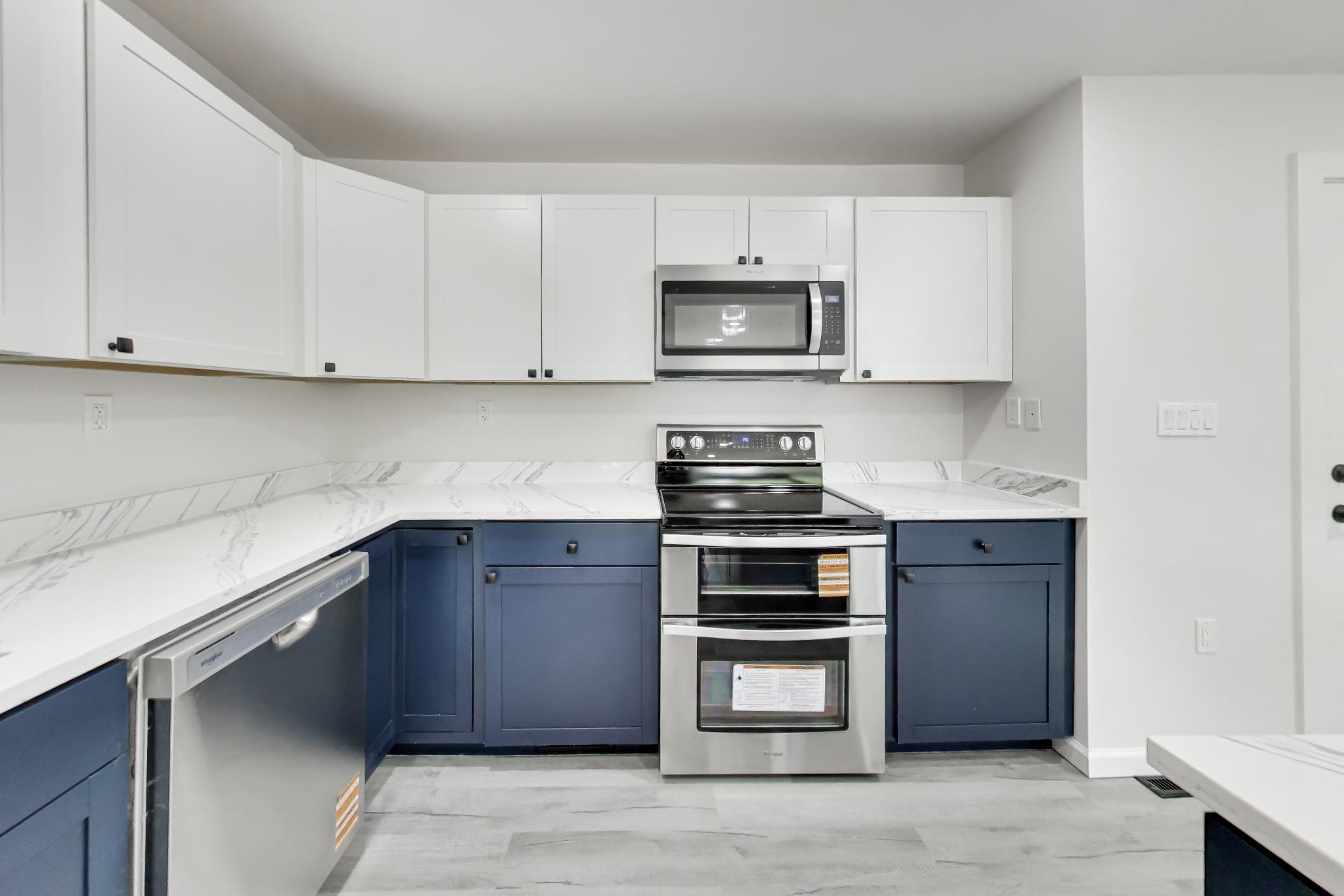 810 Malta Lane Silver Spring, MD 20901 - Photo 13 of 35 Modern kitchen w/ quartz countertops.