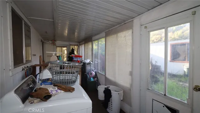 a room with furniture and a window