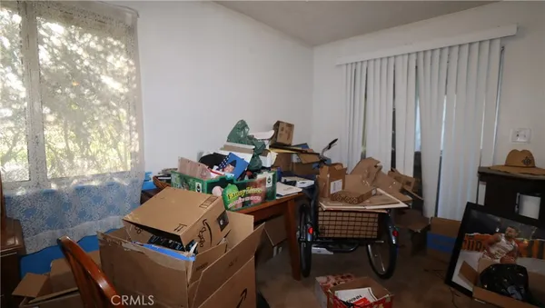 a view of a workspace with furniture