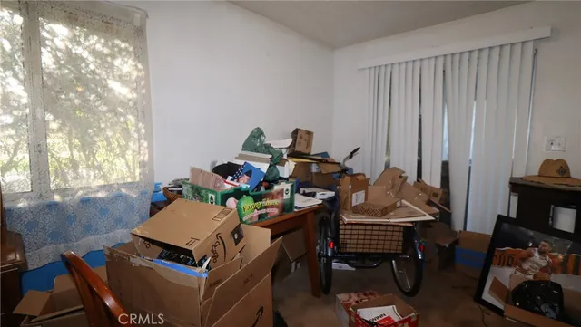 a view of a workspace with furniture