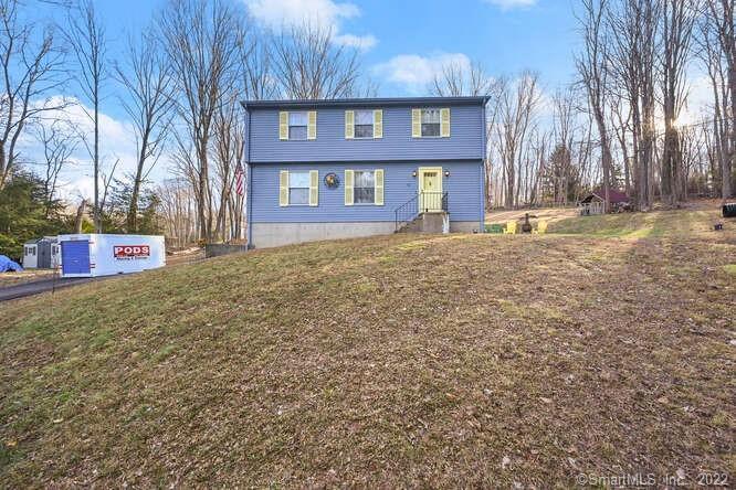 50 Gelding Hill Road Newtown, CT 06482 - Photo 1 of 1 a view of a brick house with a yard