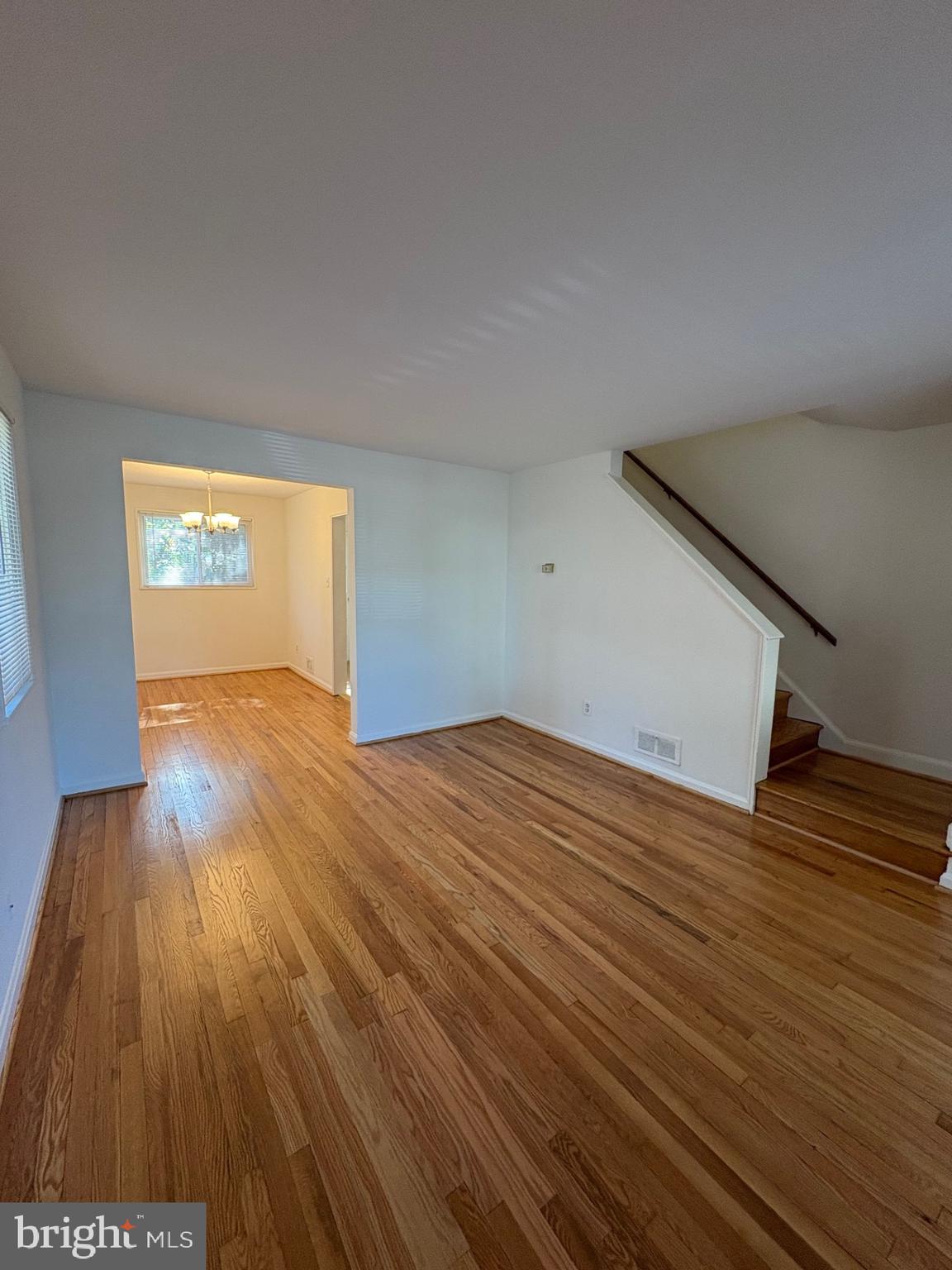 3222 13th Road South Arlington, VA 22204 - Photo 2 of 18 a view of empty room with wooden floor