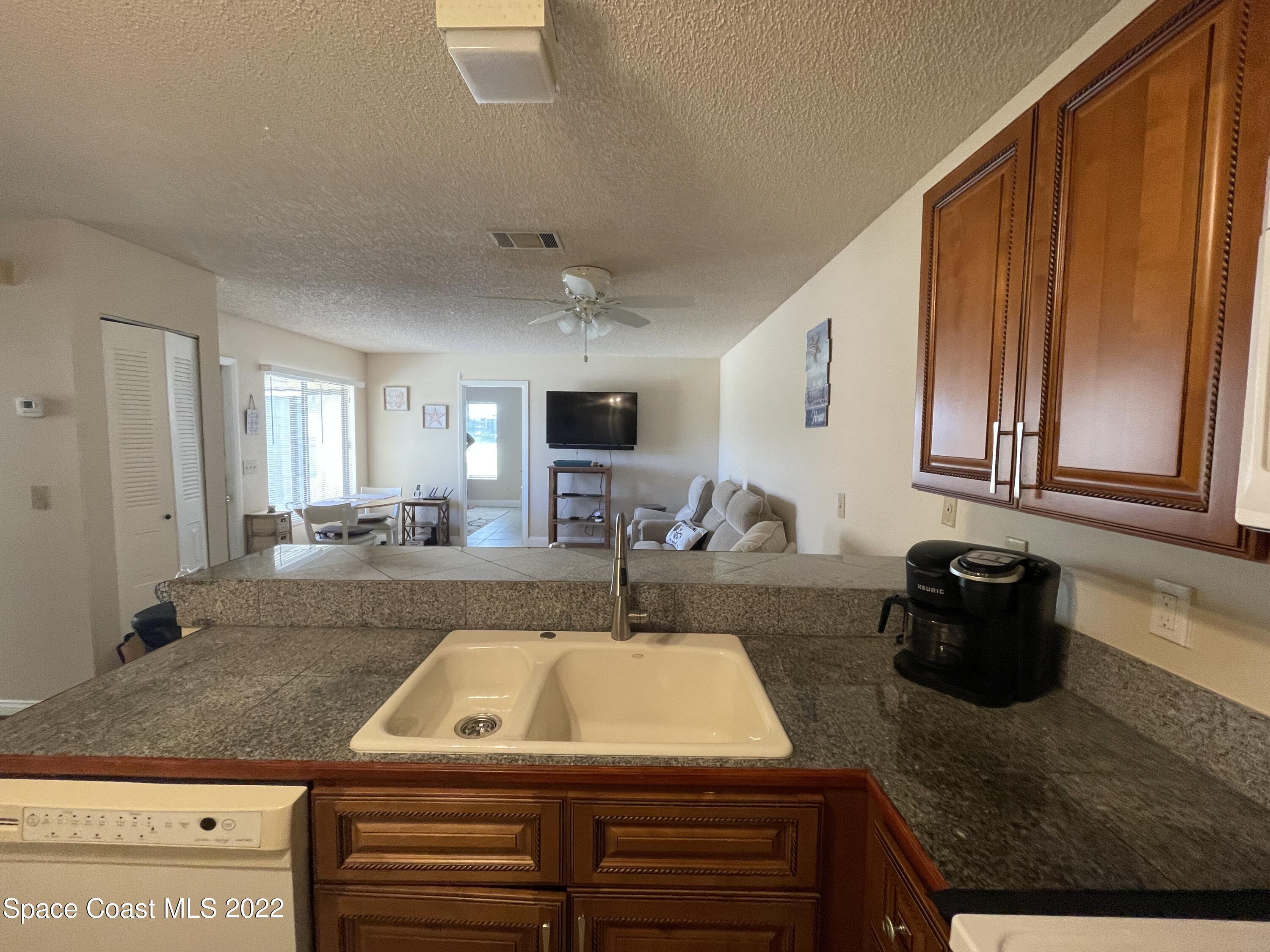 1440 Sheafe Avenue Northeast, Unit 112 Palm Bay, FL 32905 - Photo 7 of 19 IMG_6967