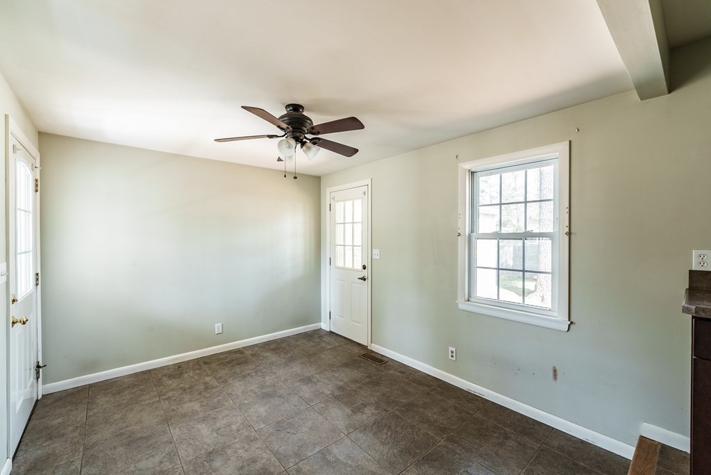 16 Middlebrook Drive Springfield, MA 01129 - Photo 4 of 30 wooden floor in an empty room with a window