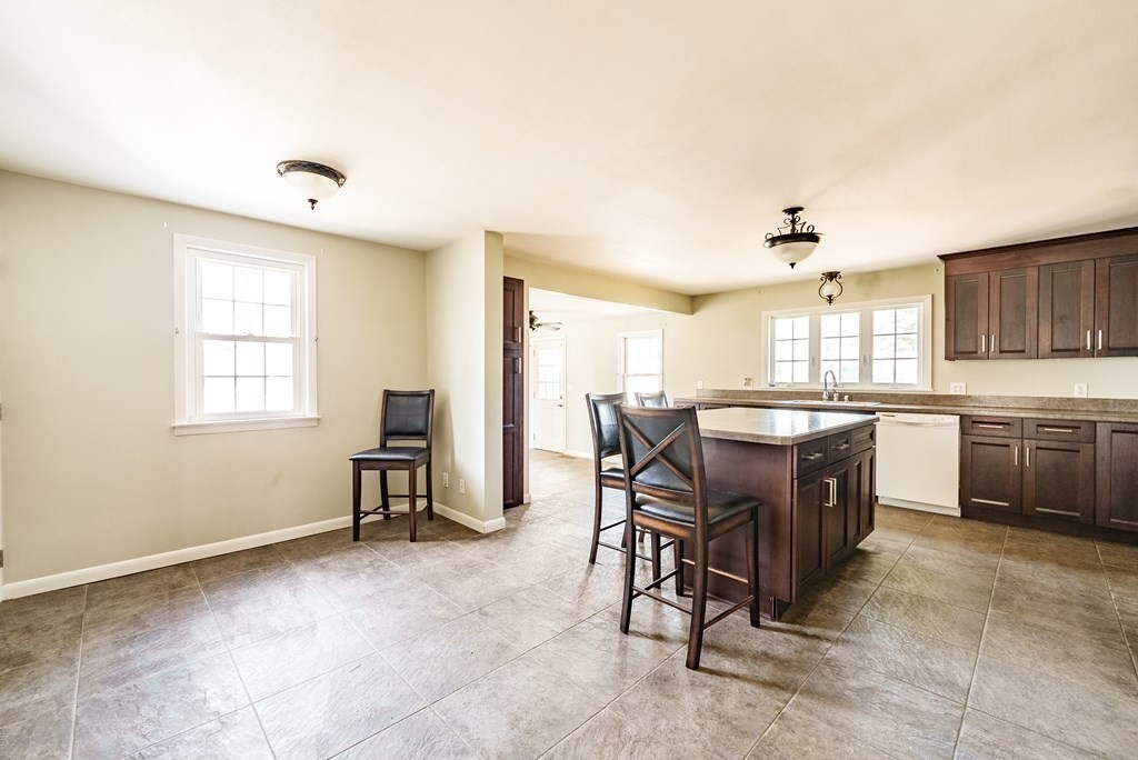 16 Middlebrook Drive Springfield, MA 01129 - Photo 9 of 30 a view of a dining room with furniture and a window