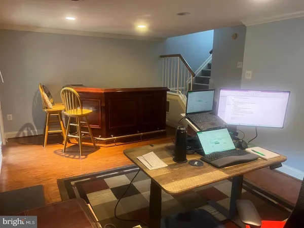 a workspace with table tennis table and chair