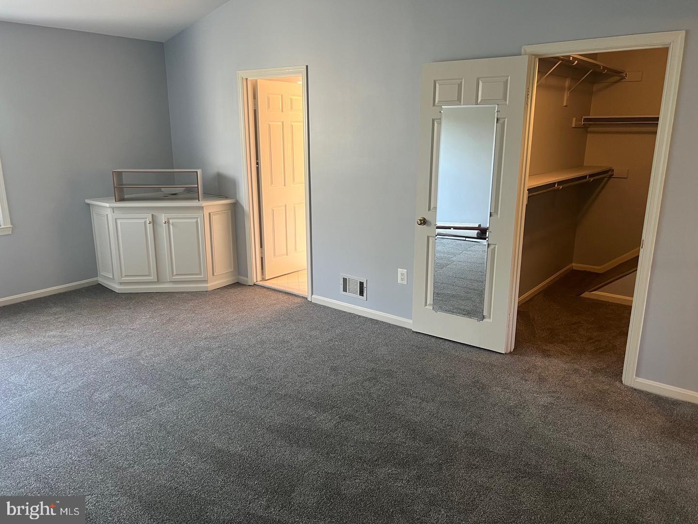 6830 Wild Rose Court Springfield, VA 22152 - Photo 5 of 8 Primary bedroom w walk-in closet