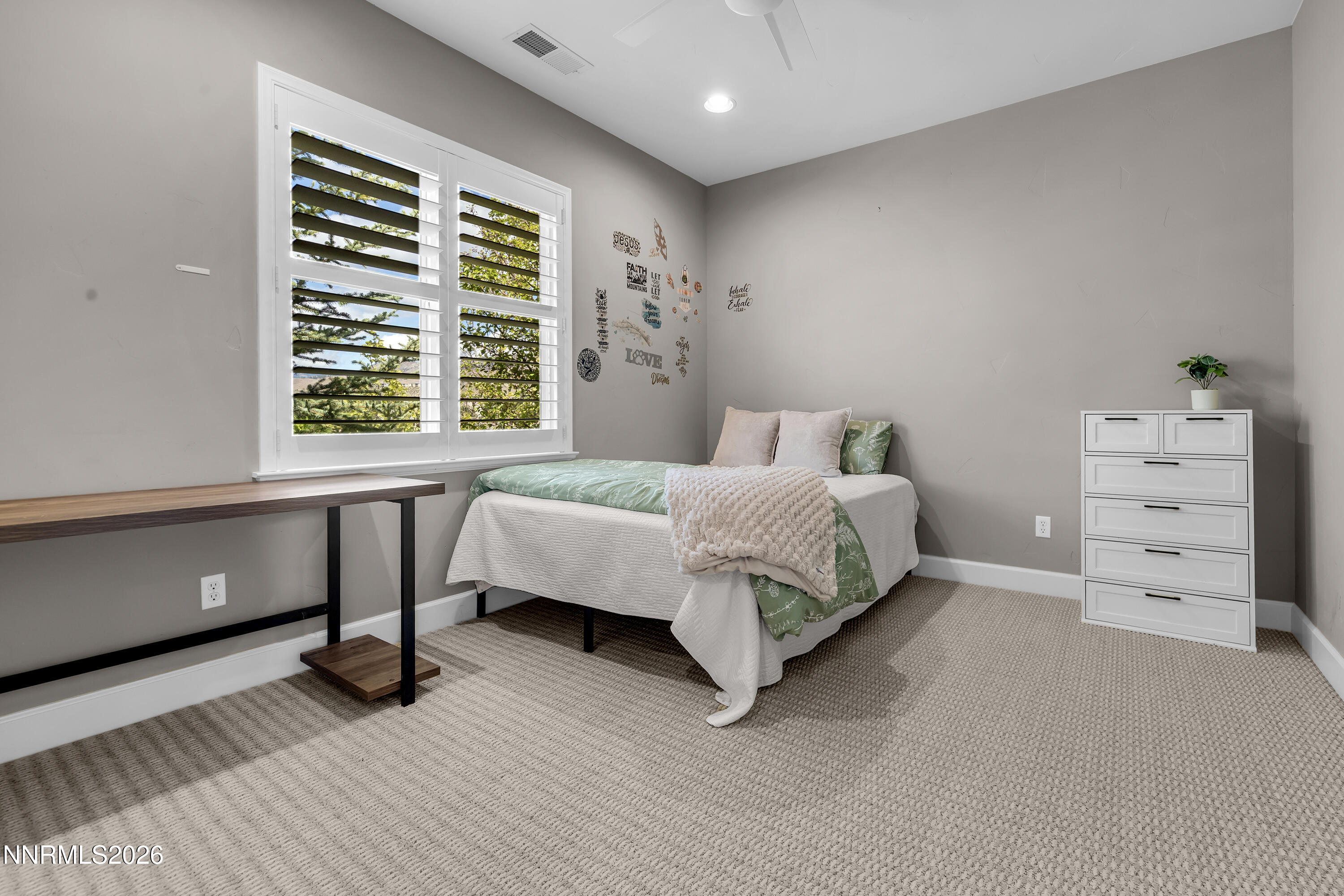 1898 Laurel Ridge Drive Reno, NV 89523 - Photo 57 of 87 a bedroom with a bed and a window